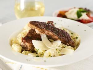 braised beef short ribs and ricotta gnocchi with charred pepper cream sauce recipe image