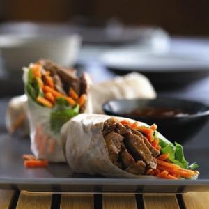 beef spring rolls with carrots and cilantro recipe image