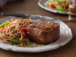 asian top loin filets with soba noodle and vegetable salad recipe image