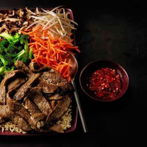 bibimbap-style korean-marinated flank steak recipe image