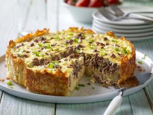 country beef breakfast sausage and goat cheese egg bake with hash-brown crusts recipe image
