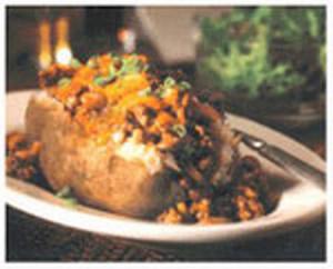 beef chilin cheddar-topped potatoes recipe image