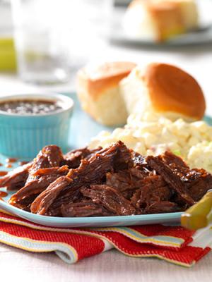 slow-cooked whiskey-molasses shredded beef recipe image