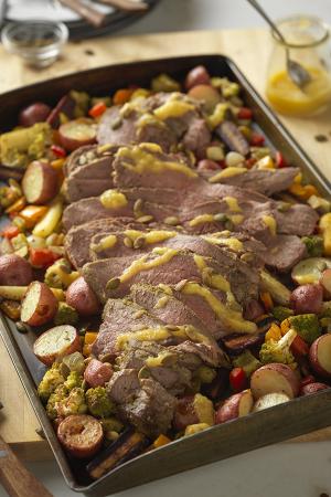 roasted beef tri-tip with rosemary pesto vegetables and gin apricot sauce recipe image