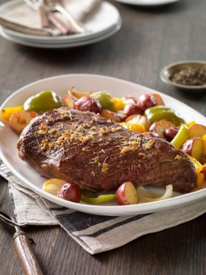 beef tri-tip roast with rosemary-garlic vegetables recipe image