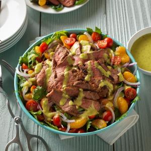 grilled spicy steak salad with guacamole salsa recipe image