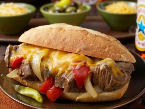 sweet onion and pepper beef sandwiches with au jus recipe image