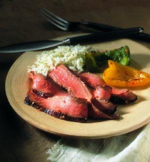 southwest marinated beef steak with grilled peppers recipe image