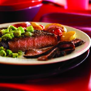 cumin-rubbed steaks with avocado salsa verde recipe image