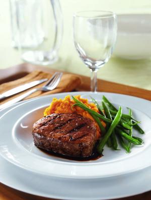 espresso-bourbon steaks with mashed sweet potatoes recipe image