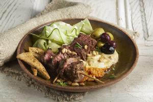 greek beef steak and hummus plate recipe image