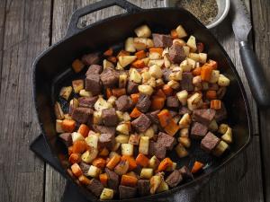beef steak and root vegetable hash recipe image