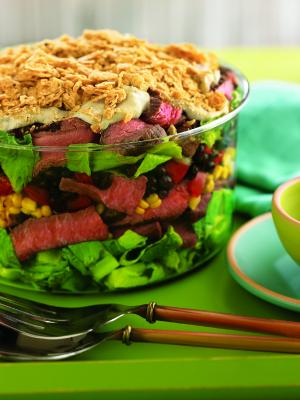 southwest steak and many layered salad recipe image