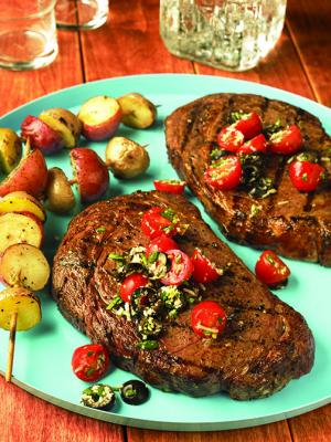 ribeye steaks with fresh tomato tapenade recipe image