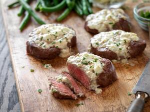 beef tenderloin steaks with blue cheese topping recipe image