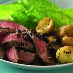 caesar beef steak with chunky olive tapenade recipe image