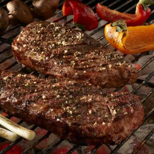 garden herb strip steaks recipe image