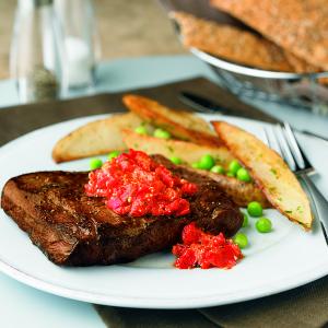 pan-seared steaks with romensco sauce recipe image