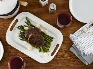 sous vide tenderloin steaks with asparagus and onions recipe image