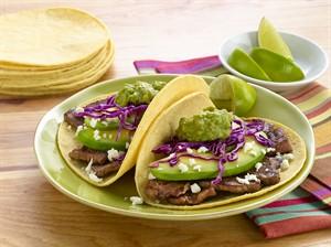 beef tacos with pomegranate guacamole recipe image