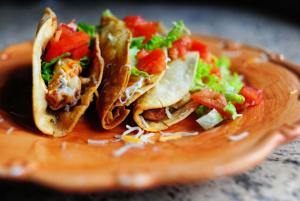crispy beef and potato tacos with norteno salsa recipe image
